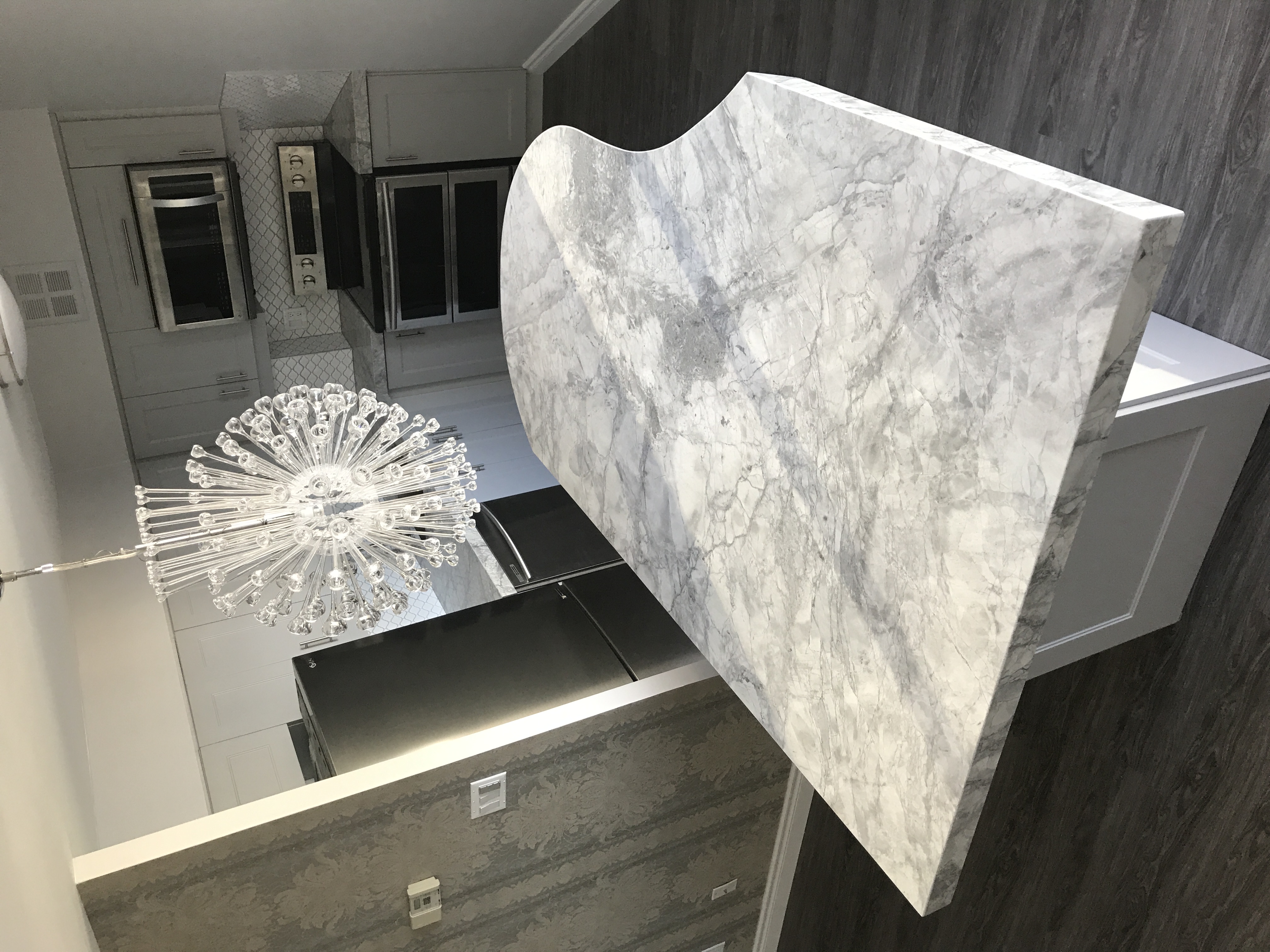 Custom Organic-Shaped Marble Island | Mitered Edge Waterfall Fabrication
